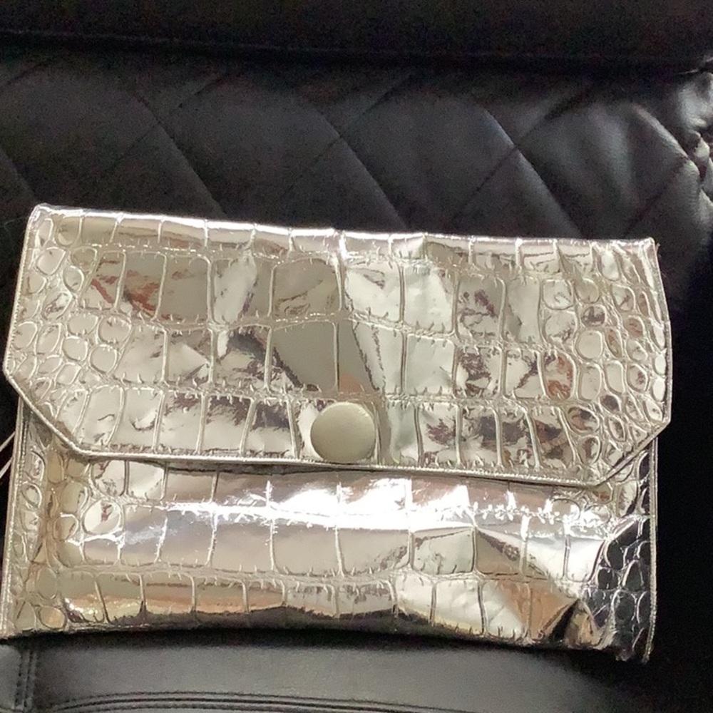 Silver oversized clutch